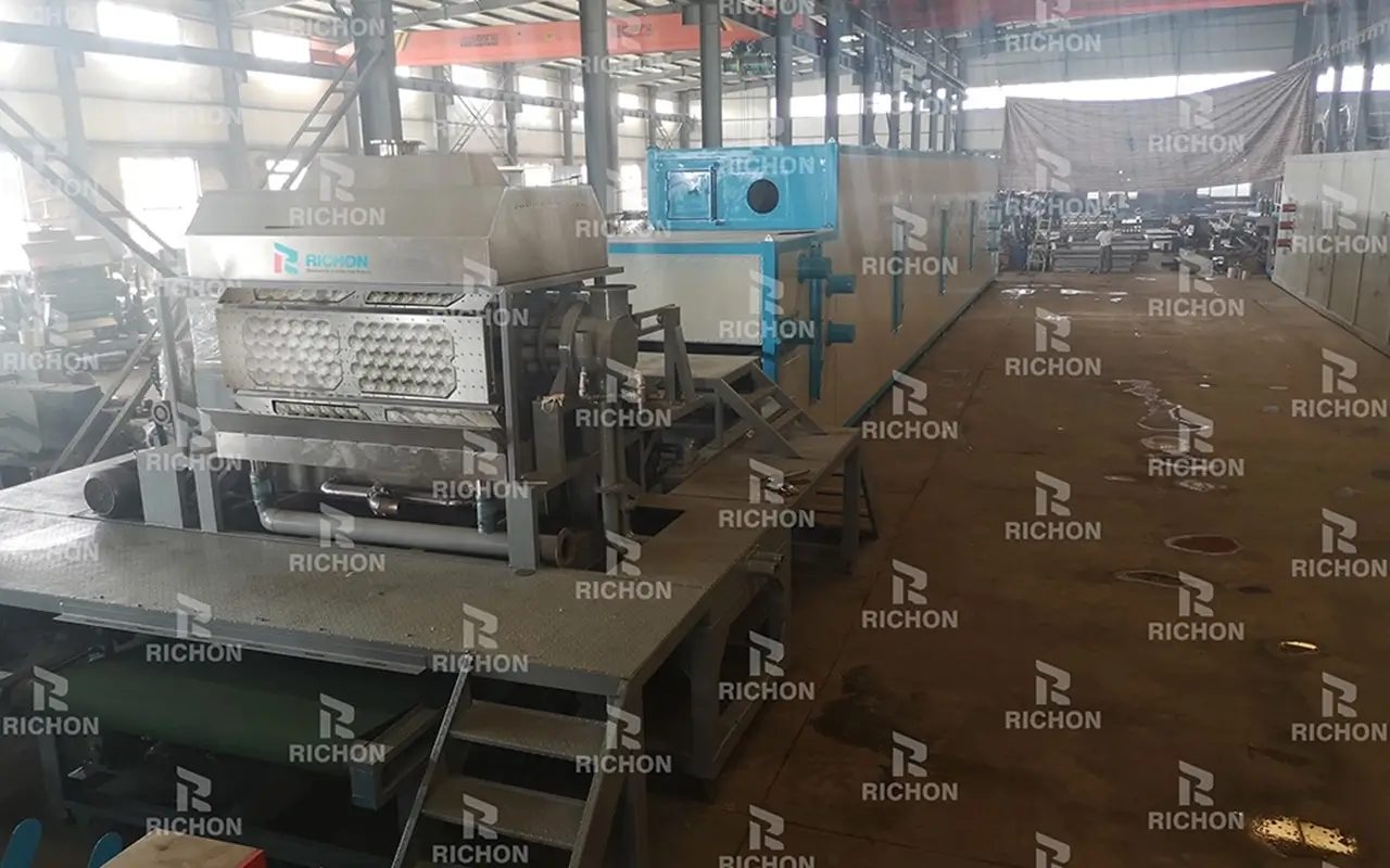 REM4-8 egg tray machine installed in India in 2013, producing 2,100 pieces per hour, serving high-volume production needs with adaptable design and local materials