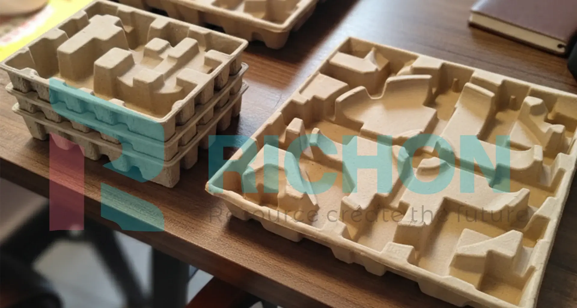 Industrial molded pulp packaging products for bottles and electronics