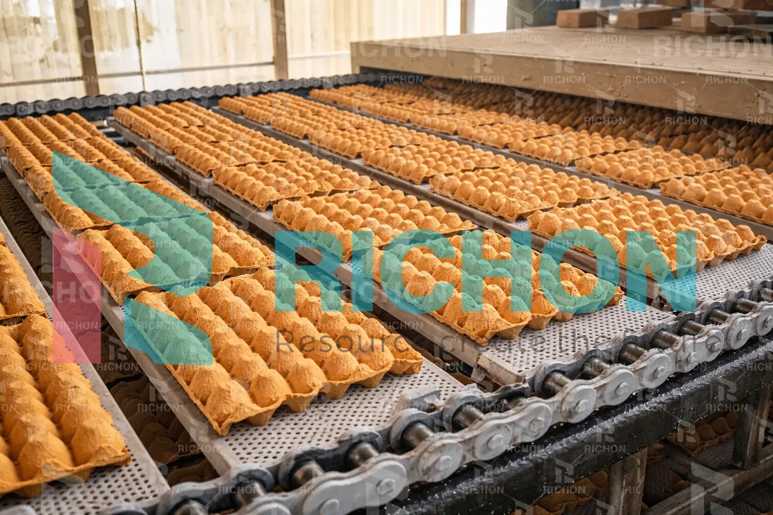 Transfer system moving wet trays after forming to improve stability and reduce deformation